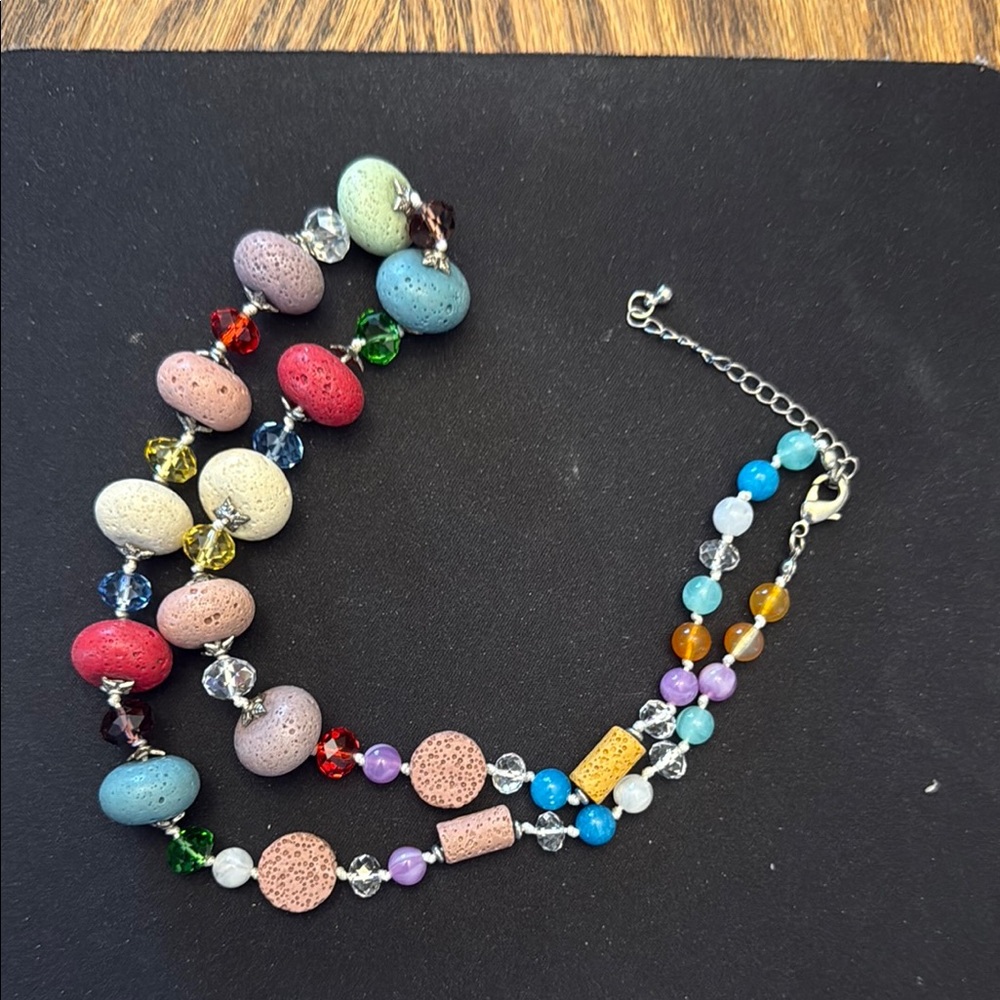 Cute multi colored necklace 24". Blues reds greens browns